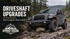 Driveshaft Upgrades: Jeep Wrangler on a rocky trail with Offroad Trading Company logo