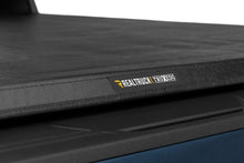 Load image into Gallery viewer, TruXport Tonneau Cover Black 2020-2026 Silverado/Sierra 2500 HD/3500 HD 6 Foot 9 Inch Bed Truxedo