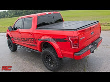 Load image into Gallery viewer, Hard Folding Bed Cover 6.5 Ft Bed 19-21 Ram 1500 2WD/4WD Rough Country