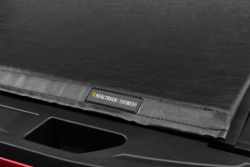 Lo Pro Tonneau Cover Black 2016-2018 (2019 Legacy/Limited) Silverado/Sierra 1500/2016-2019 2500 HD/3500 HD 6 Foot 6 Inch Bed with Sport Bar Truxedo