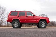Load image into Gallery viewer, Rough Country Lift Kits Jeep Cherokee XJ 3 Inch Series II Suspension Lift Kit w/V2 Shocks Leaf Springs For 84-01 Jeep Cherokee XJ Rough Country - 630X70