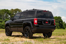 Load image into Gallery viewer, 2 Inch Lift Kit N3 Struts 10-17 Jeep Patriot 4WD Rough Country