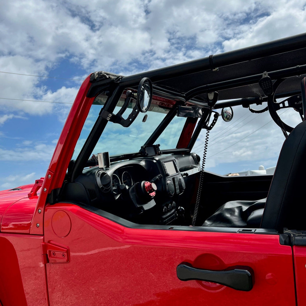 CMM Offroad inverted handle on red Jeep aftermarket cage — available from Offroad Trading Company