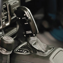 Load image into Gallery viewer, CMM Offroad Jeep center console with billet shifter installed — available from Offroad Trading Company