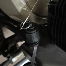 Load image into Gallery viewer, CMM Offroad air coupler cork installed beside Jeep interior trim — available from Offroad Trading Company