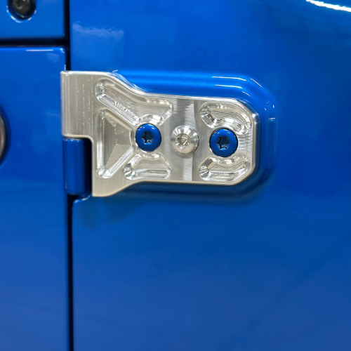CMM Offroad billet door hinge mounted on blue Jeep door — available from Offroad Trading Company