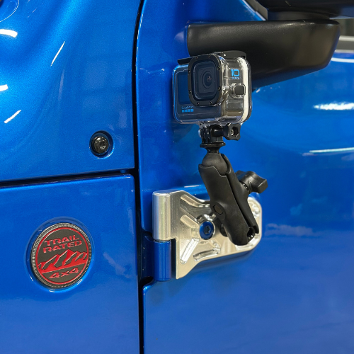 CMM Offroad billet door hinge installed on blue Jeep — available from Offroad Trading Company
