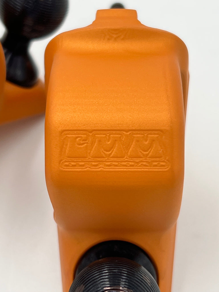 CMM Offroad close-up of orange replacement mirror mount — available from Offroad Trading Company
