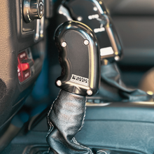 Load image into Gallery viewer, CMM Offroad Jeep center console with billet shifter installed — available from Offroad Trading Company
