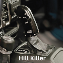 Load image into Gallery viewer, CMM Offroad Jeep center console with billet shifter installed — available from Offroad Trading Company