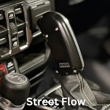 Load image into Gallery viewer, CMM Offroad Jeep center console with billet shifter installed — available from Offroad Trading Company