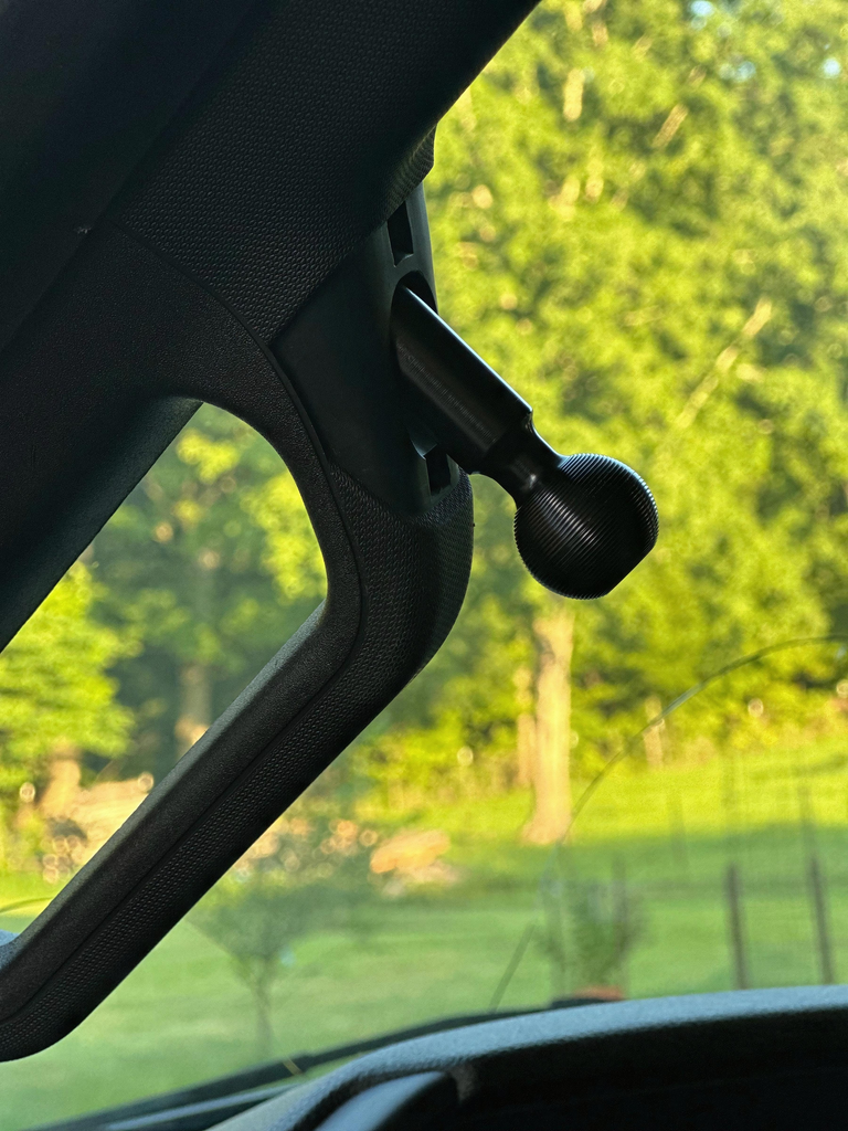CMM Offroad universal A-Pillar ball mount below grab handle — available from Offroad Trading Company