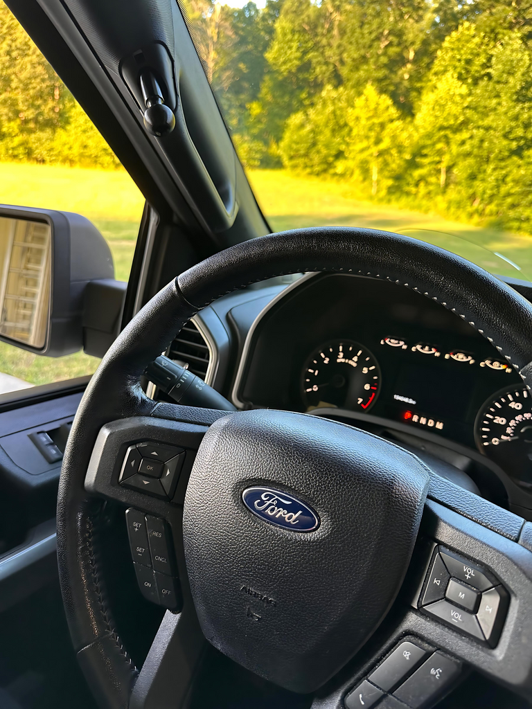 CMM Offroad A-Pillar ball mount beside steering wheel — available from Offroad Trading Company