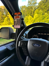 Load image into Gallery viewer, CMM Offroad driver view of phone mount — available from Offroad Trading Company
