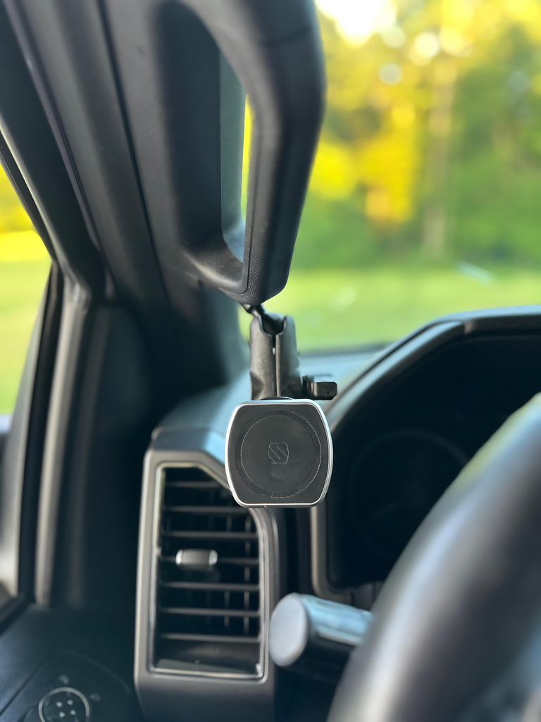 CMM Offroad RAM accessory mount beside dashboard — available from Offroad Trading Company