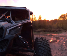 Load image into Gallery viewer, CMM Offroad UTV on trail at sunset — available from Offroad Trading Company