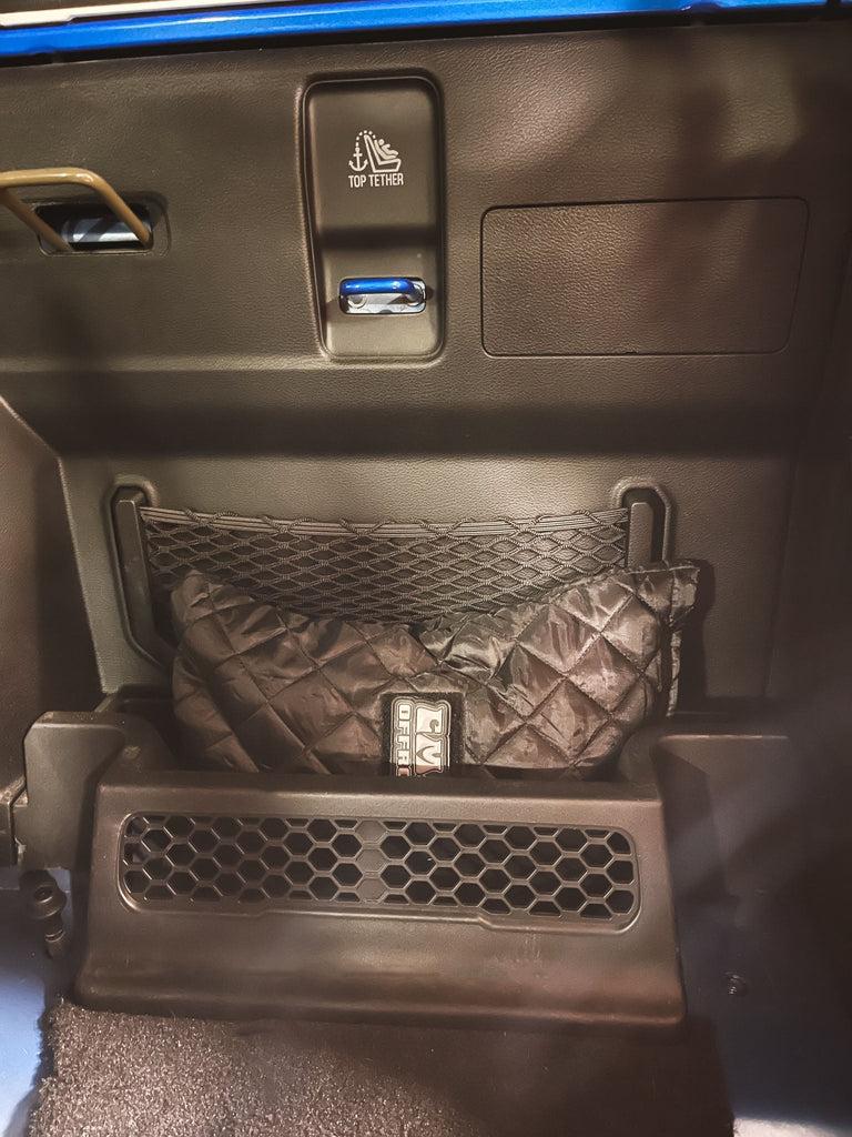 CMM Offroad mirror Sacktuary stored in Jeep interior holder — available from Offroad Trading Company
