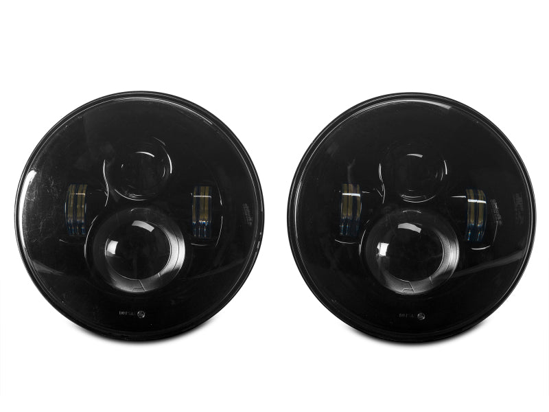 Raxiom Headlights Raxiom 97-18 Jeep Wrangler TJ/JK Axial Series LED Daymaker Headlights- Black Housing (Clear Lens)