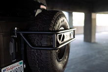 Load image into Gallery viewer, DV8 Offroad Hitch Receivers DV8 Offroad 21-23 Ford Bronco Spare Tire Guard &amp; Accessory Mount
