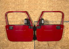 Load image into Gallery viewer, Rugged Ridge Body Side Moldings Rugged Ridge Wall Mount Door Holder