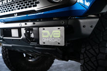 Load image into Gallery viewer, DV8 Offroad License Plate Relocation DV8 Offroad 21-22 Ford Bronco Factory Front Bumper License Relocation Bracket - Side