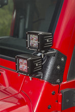 Load image into Gallery viewer, Rugged Ridge Light Mounts Rugged Ridge 97-06 Jeep Wrangler TJ Textured Black Dual A-Pillar Light Mount