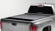 Load image into Gallery viewer, Roll-N-Lock Tonneau Covers - Retractable Roll-N-Lock 2020 Chevy Silverado / GMC Sierra 2500-3500 80-1/2in M-Series Retractable Tonneau Cover