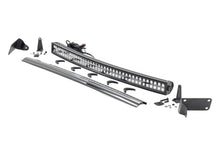 Load image into Gallery viewer, Rough Country LED Light Bars Dodge 40-inch Curved LED Light Bar Hidden Bumper Kit w/Black Series LED For 10-18 Ram 2500/3500 Rough Country - 70570B
