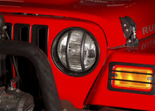 Load image into Gallery viewer, Rugged Ridge Light Mounts Rugged Ridge Headlight Bezels Black 97-06 Jeep Wrangler