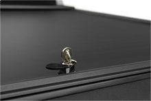 Load image into Gallery viewer, Roll-N-Lock Tonneau Covers - Retractable Roll-N-Lock 17-19 Ford F-250/F-350 Super Duty SB 80-3/8in A-Series Retractable Tonneau Cover