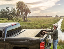 Load image into Gallery viewer, Roll-N-Lock Tonneau Covers - Retractable Roll-N-Lock 2020 Chevy Silverado / GMC Sierra 2500-3500 80-1/2in M-Series Retractable Tonneau Cover