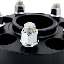 Load image into Gallery viewer, Mishimoto Wheel Spacers &amp; Adapters Mishimoto Wheel Spacers - 5X114.3 / 70.5 / 30 / M14 - Black