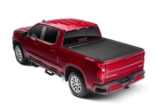 Load image into Gallery viewer, Roll-N-Lock Tonneau Covers - Retractable Roll-N-Lock 14-18 Chevy Silverado/Sierra 1500 XSB 68in M-Series Retractable Tonneau Cover