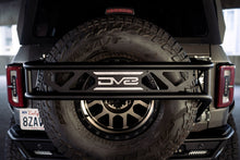 Load image into Gallery viewer, DV8 Offroad Hitch Receivers DV8 Offroad 21-23 Ford Bronco Spare Tire Guard &amp; Accessory Mount