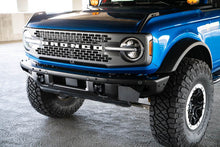 Load image into Gallery viewer, DV8 Offroad License Plate Relocation DV8 Offroad 21-22 Ford Bronco Factory Front Bumper License Relocation Bracket - Side