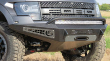 Load image into Gallery viewer, Addictive Desert Designs Bumpers - Steel Addictive Desert Designs 10-14 Ford F-150 Raptor HoneyBadger Front Bumper w/ Winch Mount