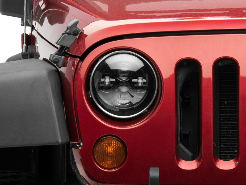 Raxiom Headlights Raxiom 97-18 Jeep Wrangler TJ/JK Axial Series LED Daymaker Headlights- Black Housing (Clear Lens)
