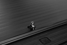 Load image into Gallery viewer, Roll-N-Lock Tonneau Covers - Retractable Roll-N-Lock 2019 Chevrolet Silverado 1500 XSB 68-3/8in A-Series Retractable Tonneau Cover