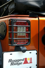Load image into Gallery viewer, Rugged Ridge Light Covers and Guards Rugged Ridge 07-18 Jeep Wrangler Textured Black Tail Light Euro Guards