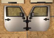 Load image into Gallery viewer, Rugged Ridge Body Side Moldings Rugged Ridge Wall Mount Door Holder