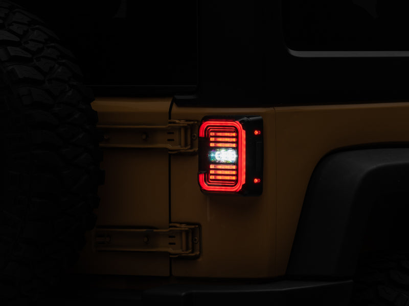 Raxiom Tail Lights Raxiom 07-18 Jeep Wrangler JK Axial Series LED Halo Tail Lights- Black Housing (Dark Smoked Lens)